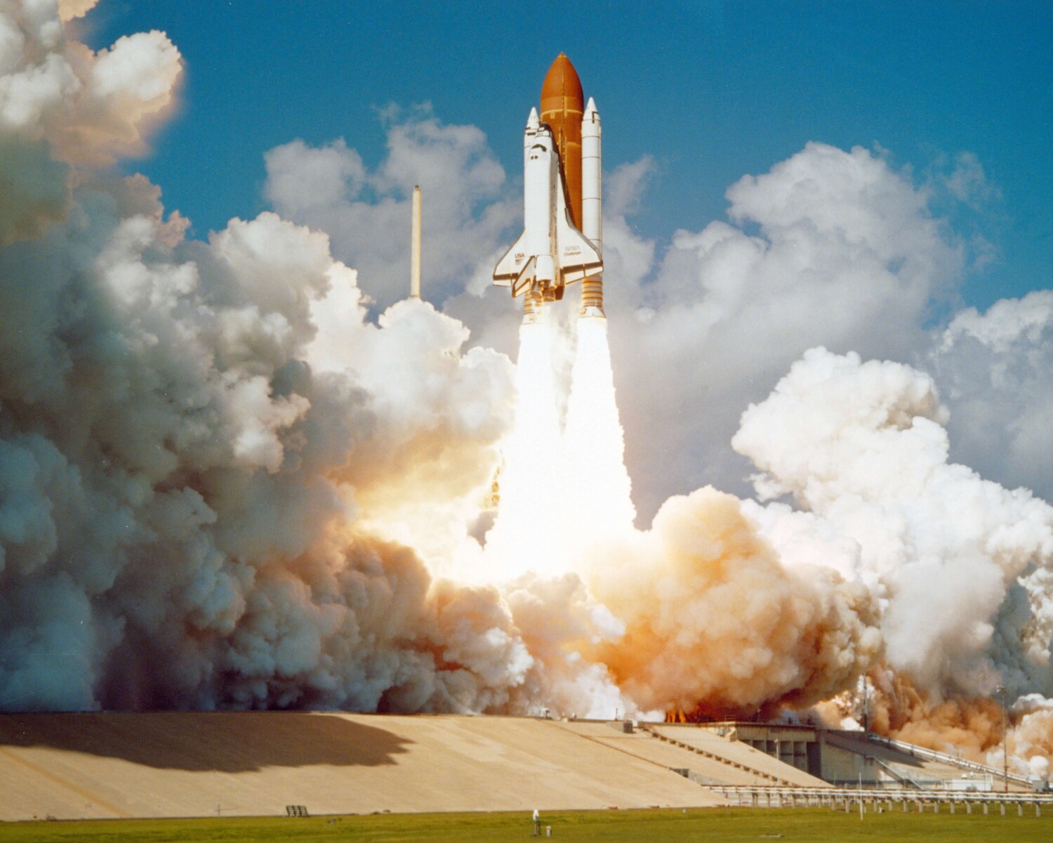 Space shuttle launching into space